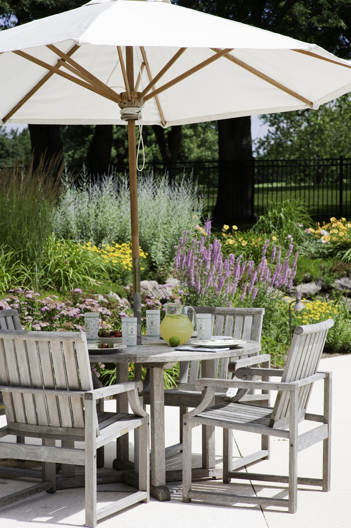 garden patio dining set with big white umbrella