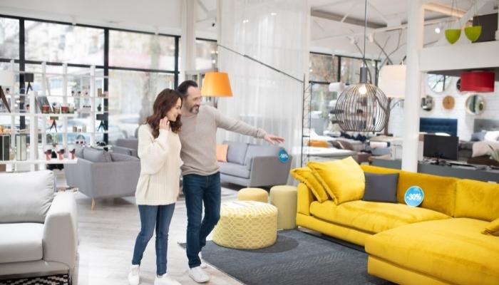 Couple furniture shopping on a budget