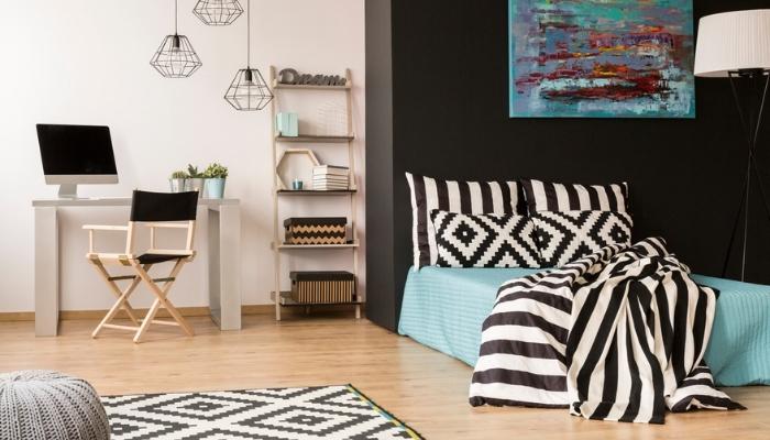 bedroom with black, white and blue details