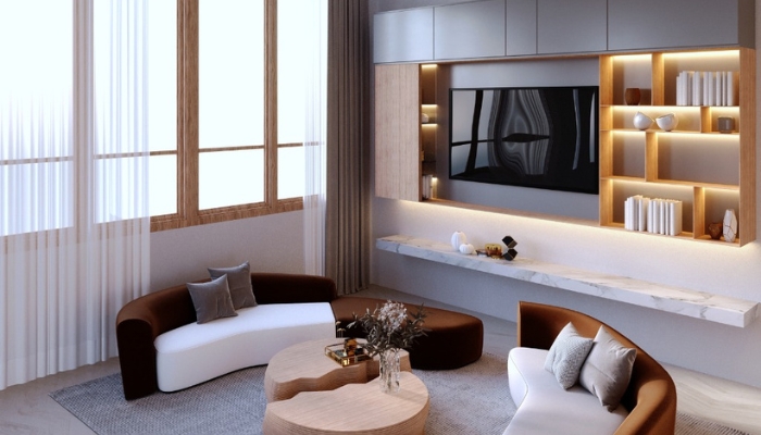TV mounted in a built-in alcove with modular seating facing it