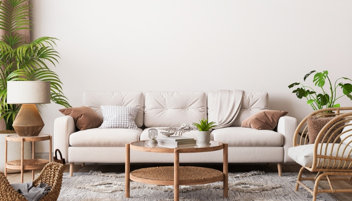 A neutral living room with brown and wooden elements.
