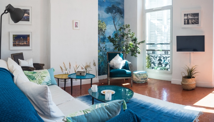 A colorful living space with patterns matching in color scheme