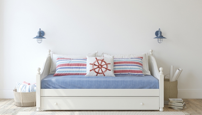 A nautical themed daybed in a children’s room.