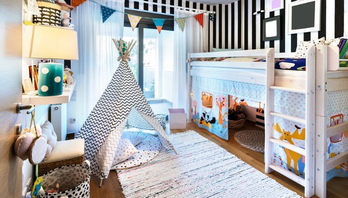 A children’s bedroom with a play tent and a fort under a bunk bed.