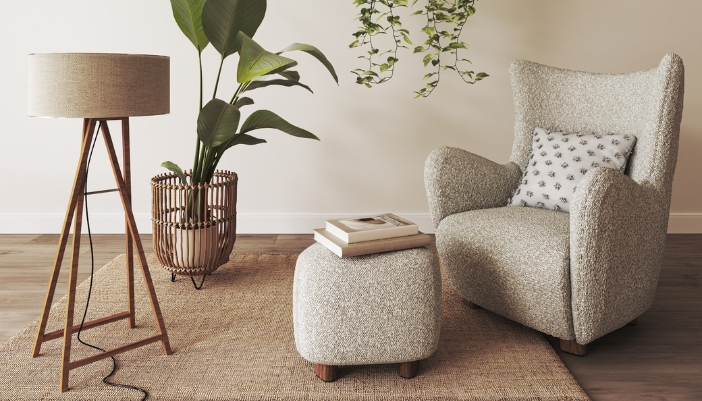 cozy corner in living room with chair and stool