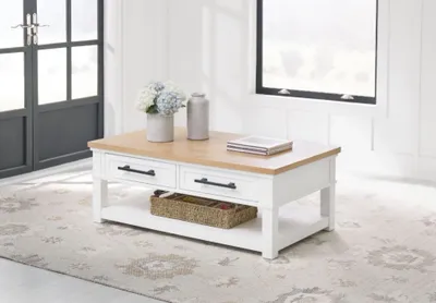 The Signature Design by Ashley Ashbryn coffee table with decor