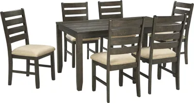 Credit: Signature Design by Ashley Front view of the Signature Design by Ashley Rokane 7-piece dining set