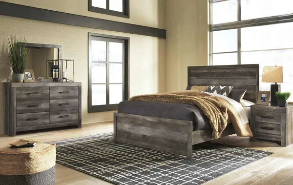 The Signature Design by Ashley Wynnlow bedroom set with décor 
