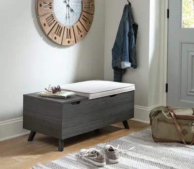 The Signature Design by Ashley Yarlow bench with décor and shoes 