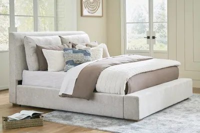 Signature Design Light Brown Upholstered Panel Bed California King