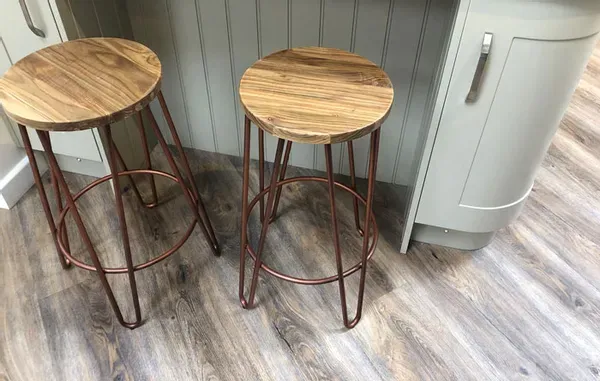 image of luxury vinyl flooring with barstools on top 