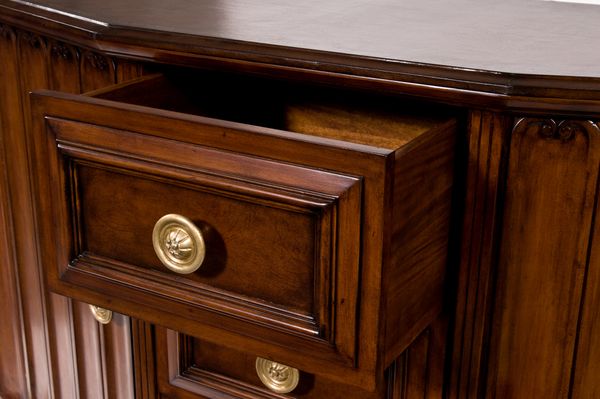 A close-up of walnut storage furniture 