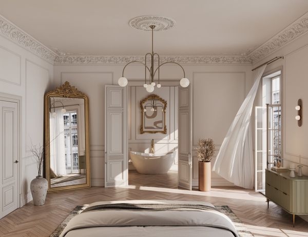 A wide shot of a white themed French country bedroom 