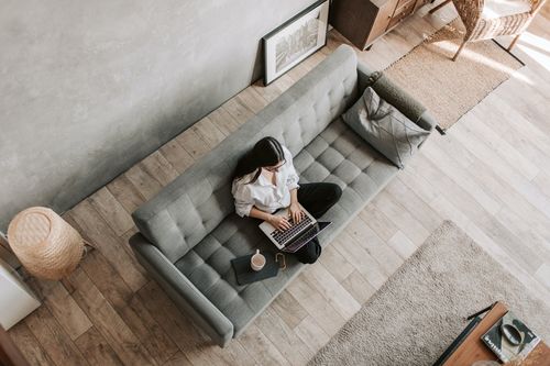 Working on a Laptop from a Couch