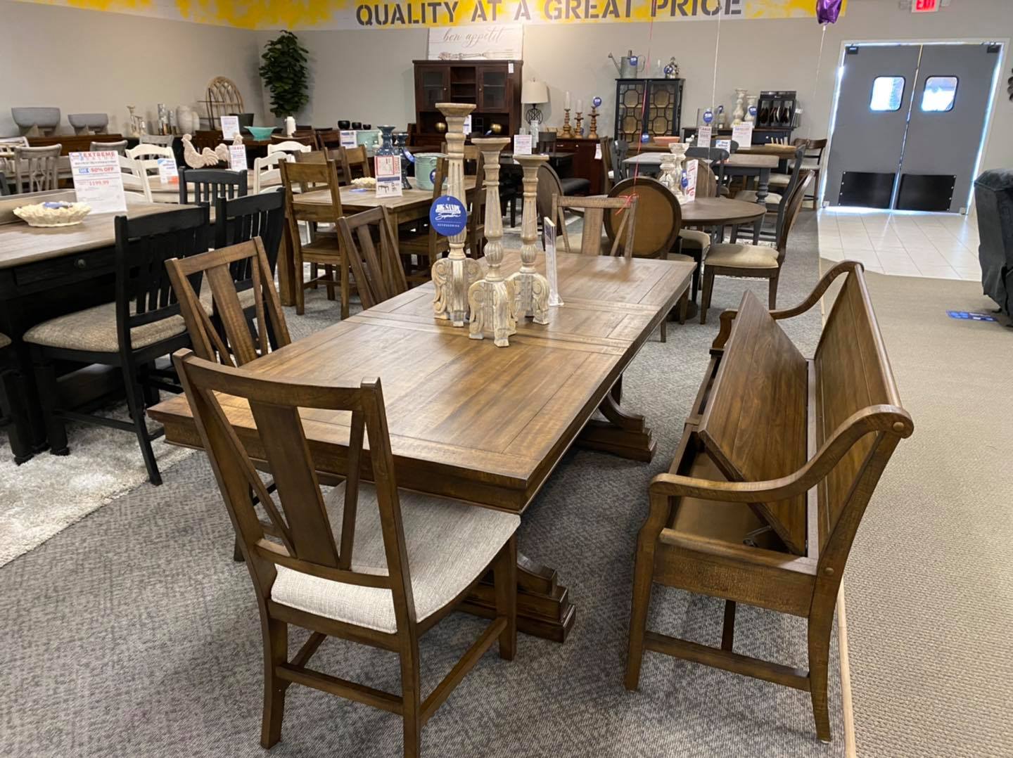 A variety of dining room sets at the Big Sandy Superstore Owosso store 