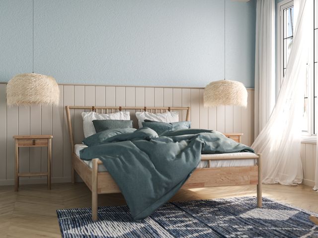 Front view of a casual coastal bedroom