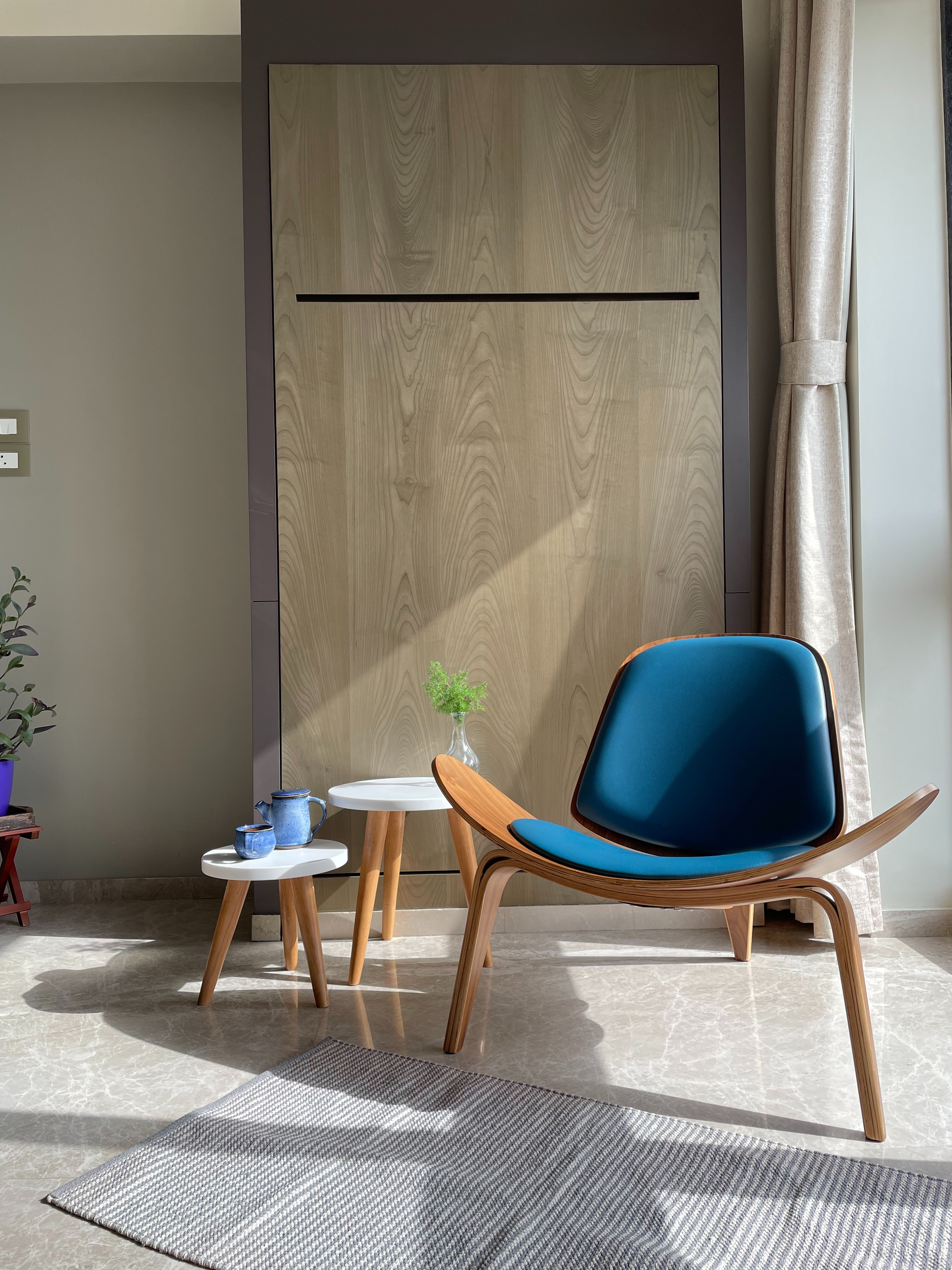 Blue chair positioned next to a chair