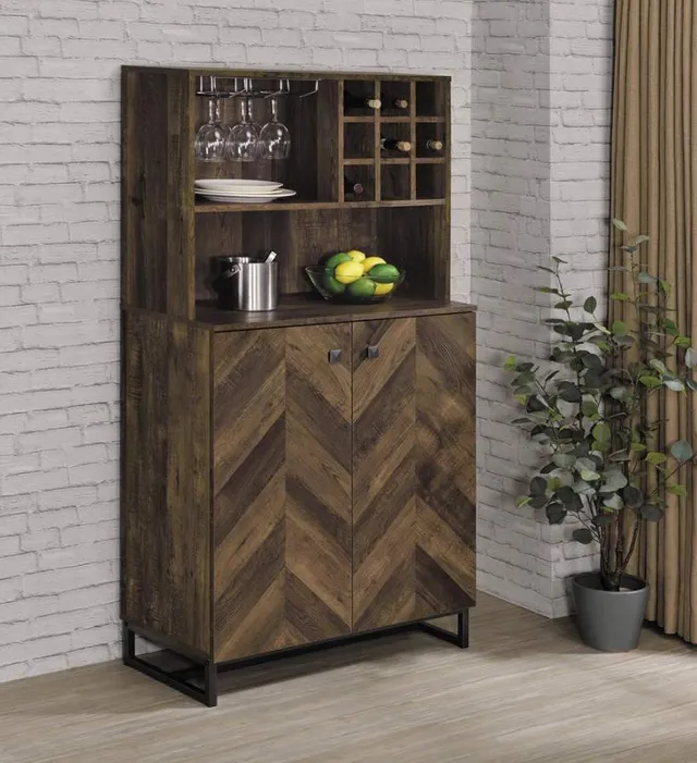 The Coaster Rustic Oak wine cabinet shown with décor, dinnerware, and wine stems 