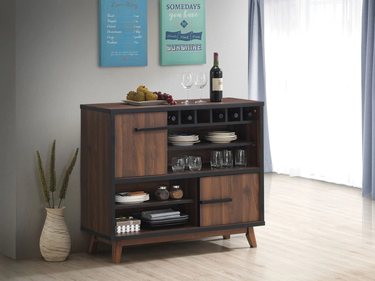 The Coaster 182873 walnut and black wine cabinet shown with plates, glasses, wine, and fruit