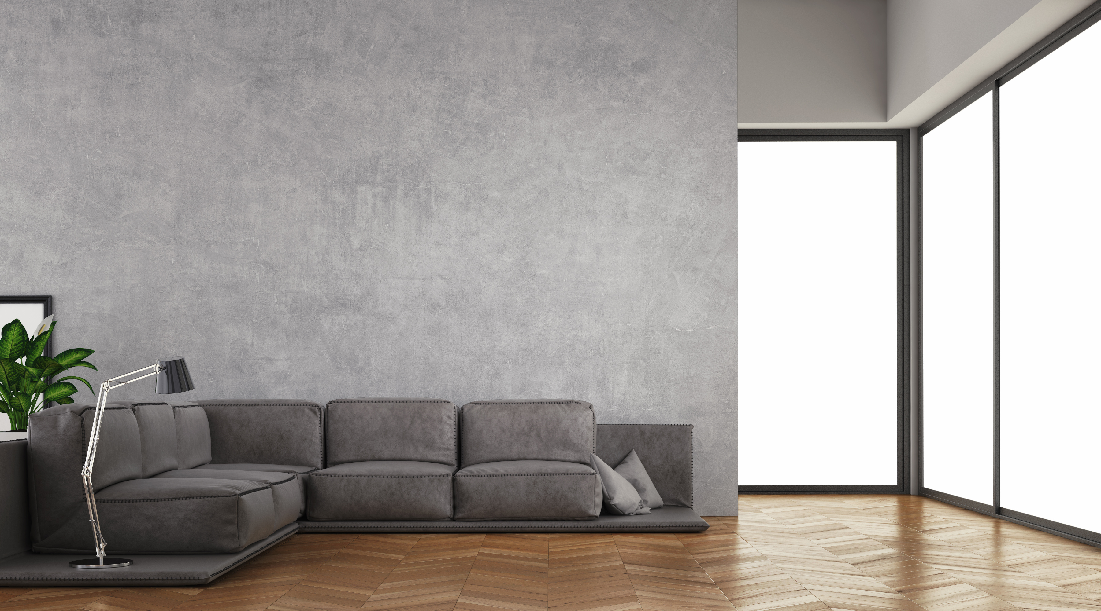 An L-shaped grey sofa in a grey living room 