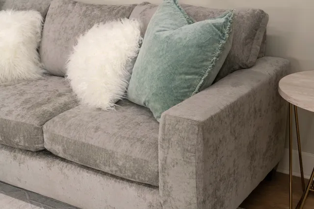 Elements International Marissa Chofa throw pillows on a sofa 