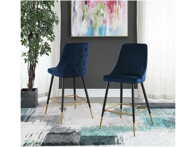 A set of Elements International Ben Broadway navy upholstered bar stools with backs 