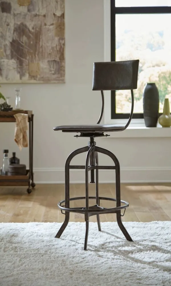 The Hammary Hidden Treasures adjustable bar stool in a dining room 