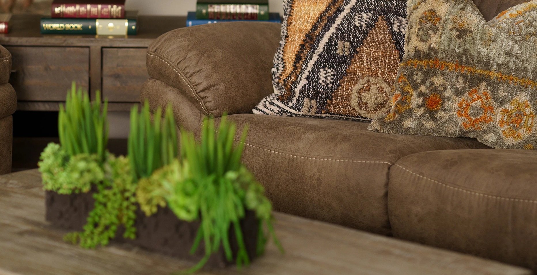 Close up of baseball stitching on the Caselli Gabrielle reclining sofa 