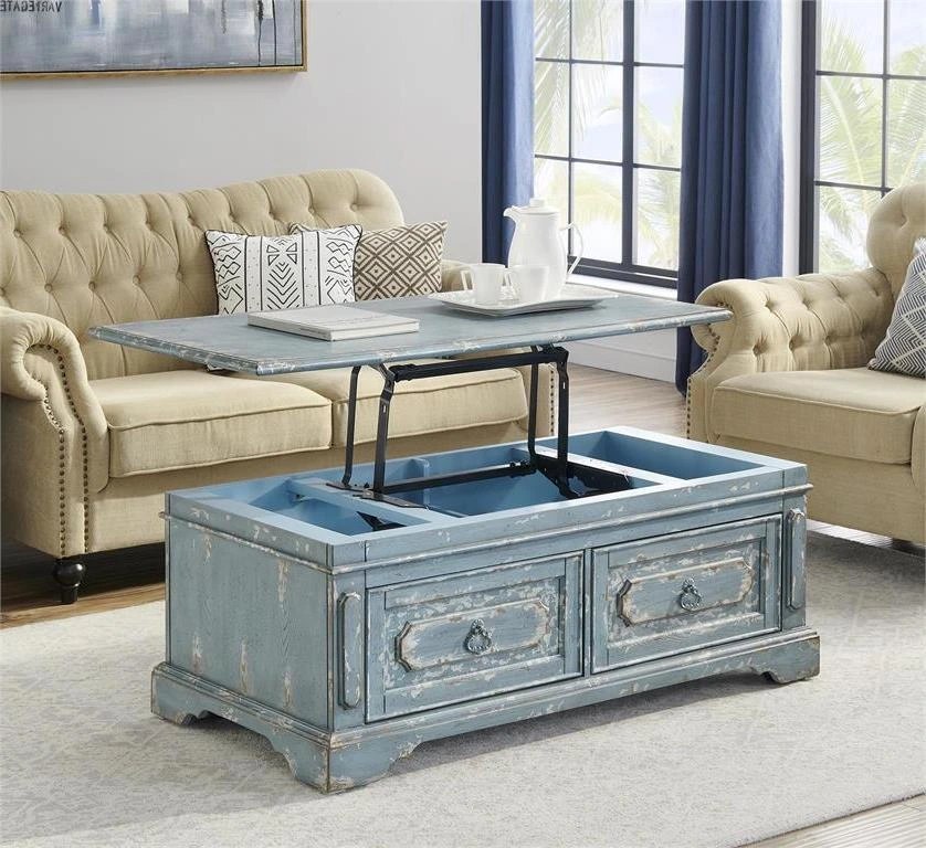 The Coast2Coast Home Cabot lift-top cocktail table with a matching cream sofa and loveseat 