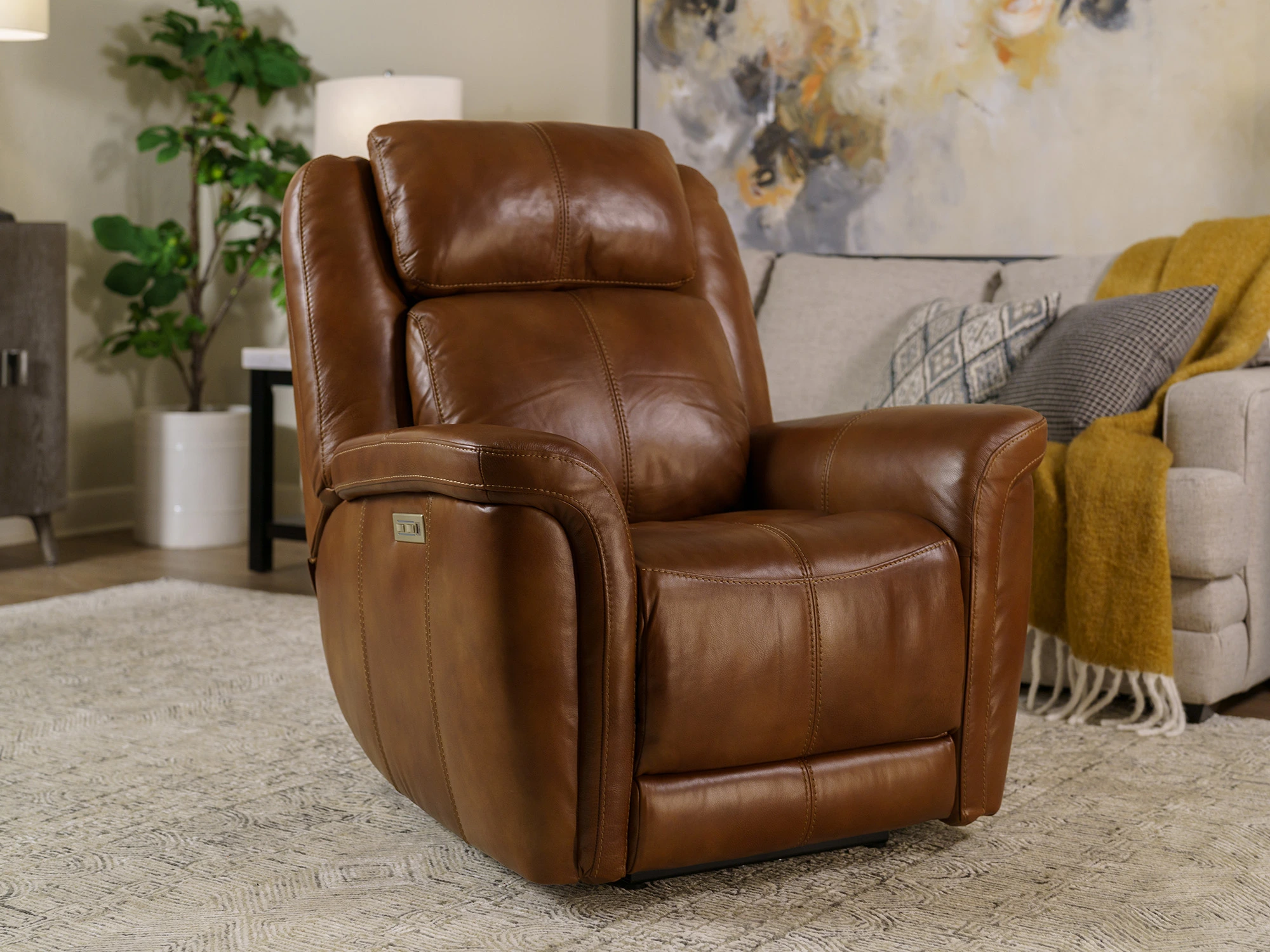 The hi-rock home Monterrey leather power recliner in a living room 