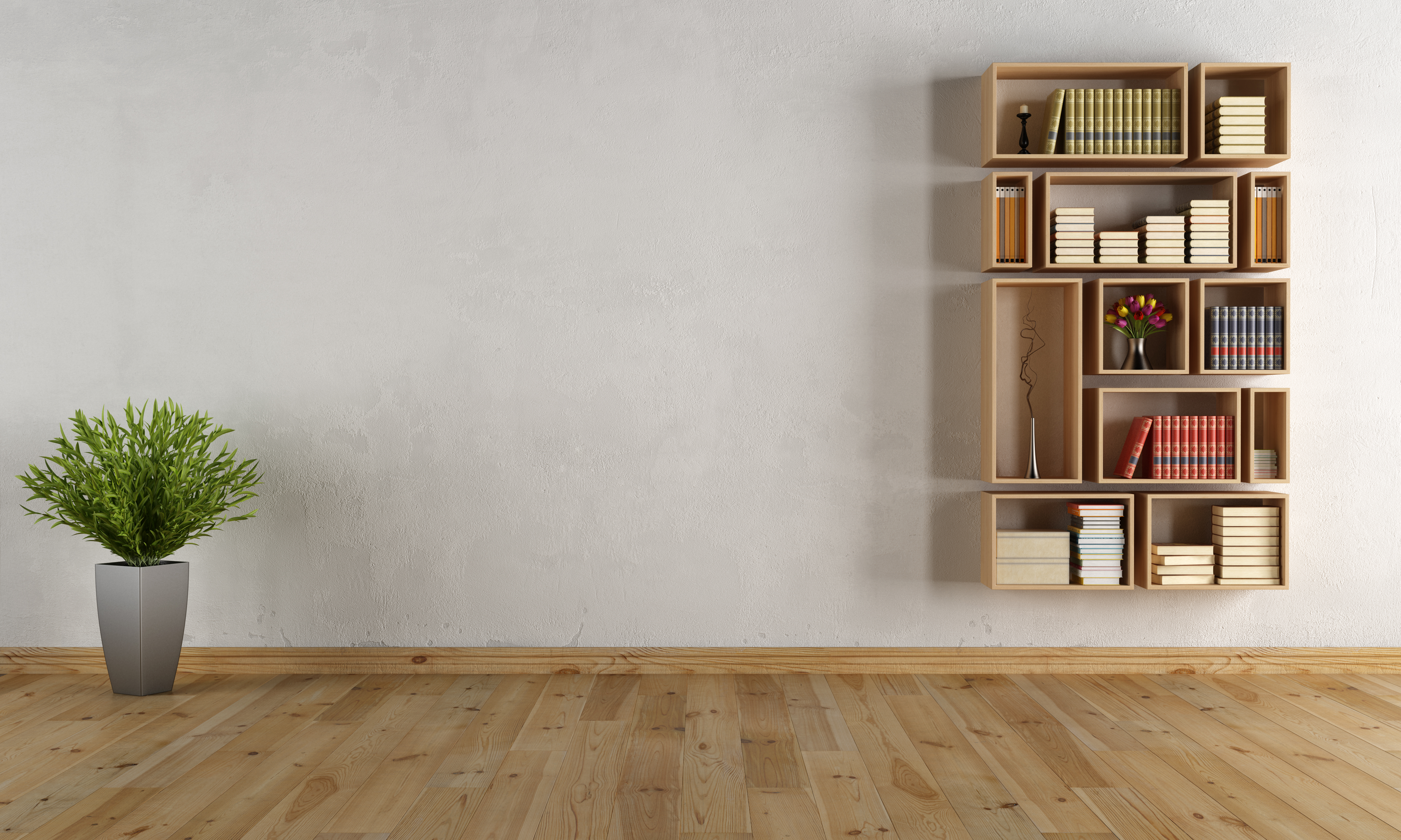 Wide shot of a living room with floating bookshelves and a planter 