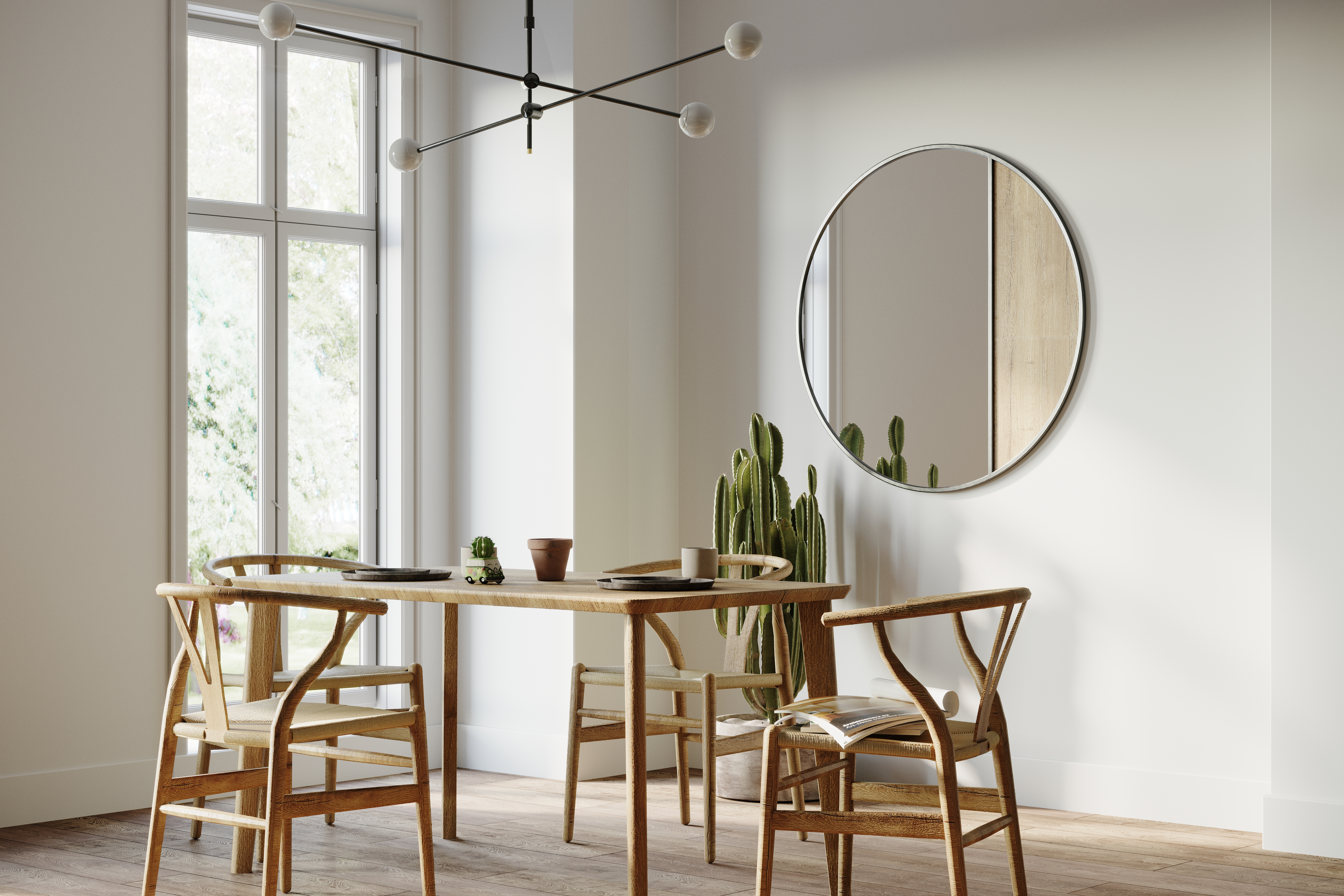 A round mirror in a dining room 