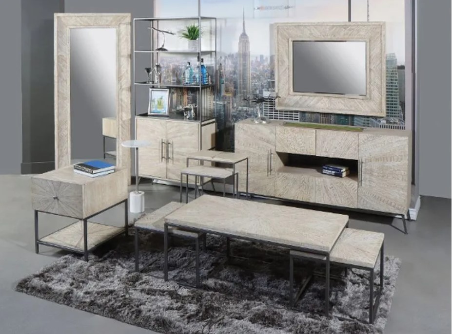 A nesting coffee table is featured in a glamorous living room
