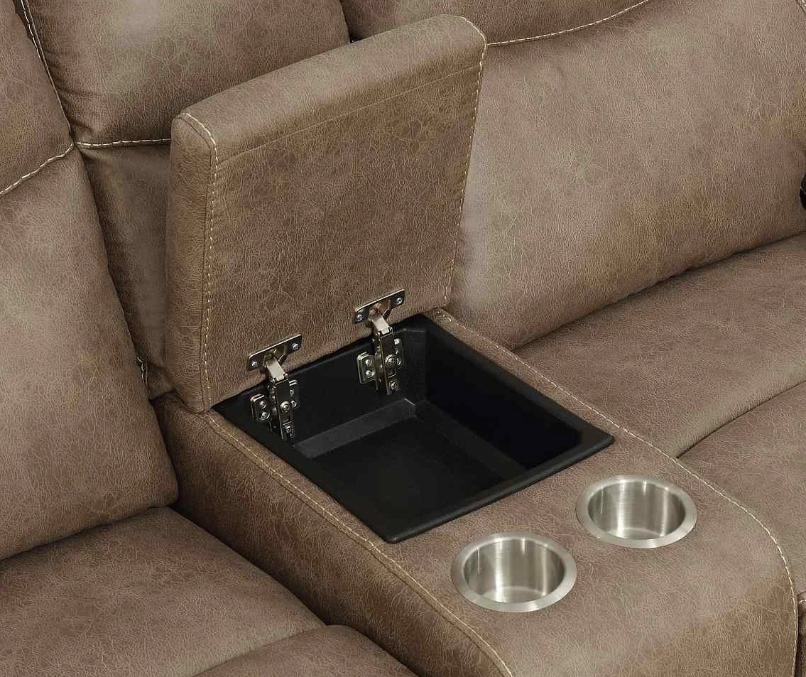 Storage console with cupholders on the Steve Silver Co. Isabella reclining loveseat 