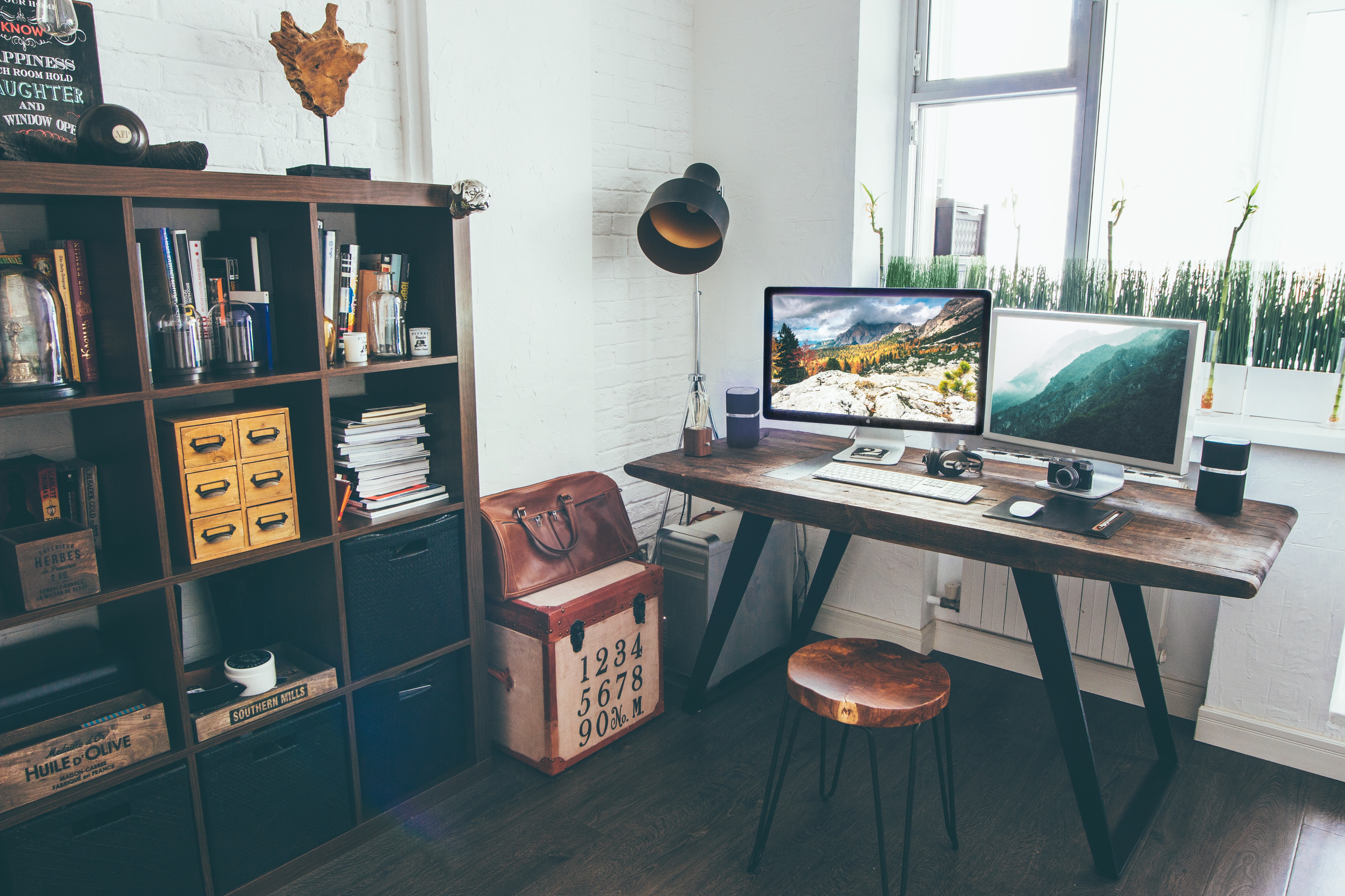 a rustic home office with cubbies and eclectic decor