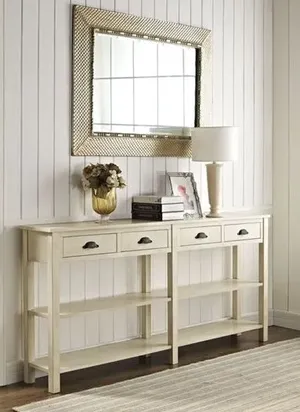 The Powell Home Fashions console table with décor 