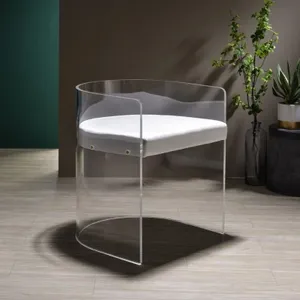 The Progressive Furniture A La Carte acrylic chair in a room with décor 