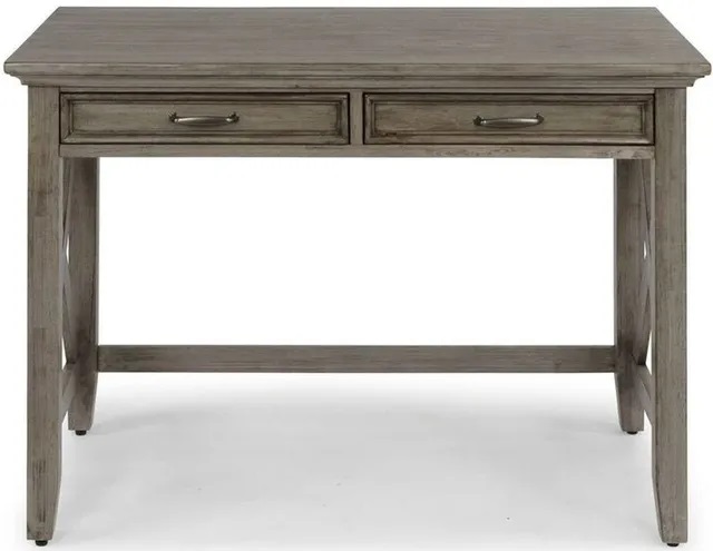 Stock photo of a gray, wooden desk for kids.
