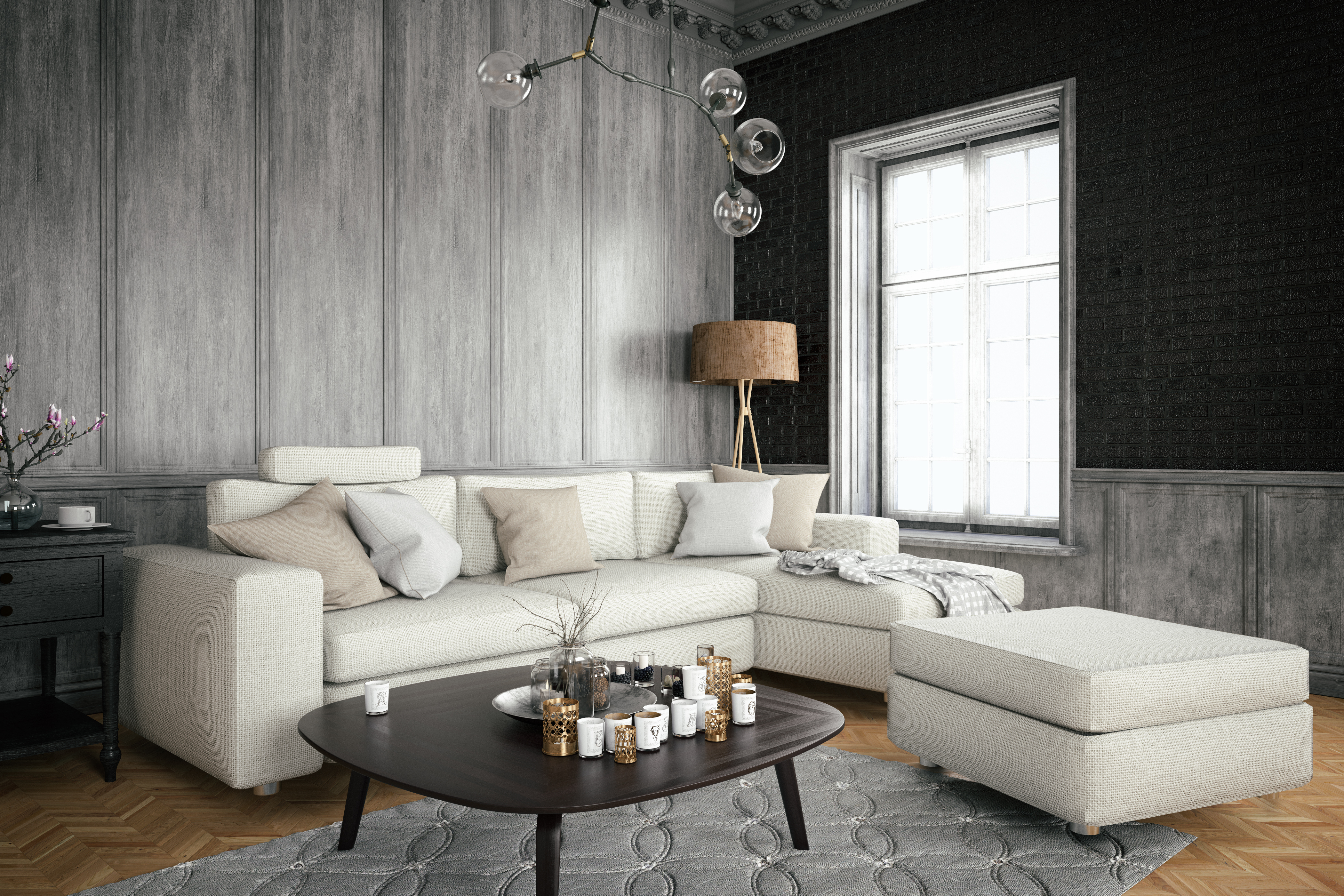 A living room with white leather furniture and a black coffee table 