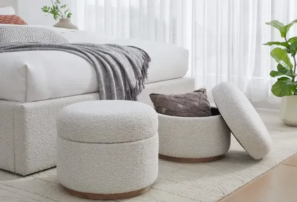 The Modus Furniture Virgil Ricotta collection boucle ottoman with décor 