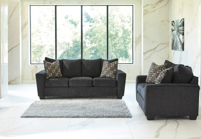 The Benchcraft Wixon sofa collection in a modern living room 