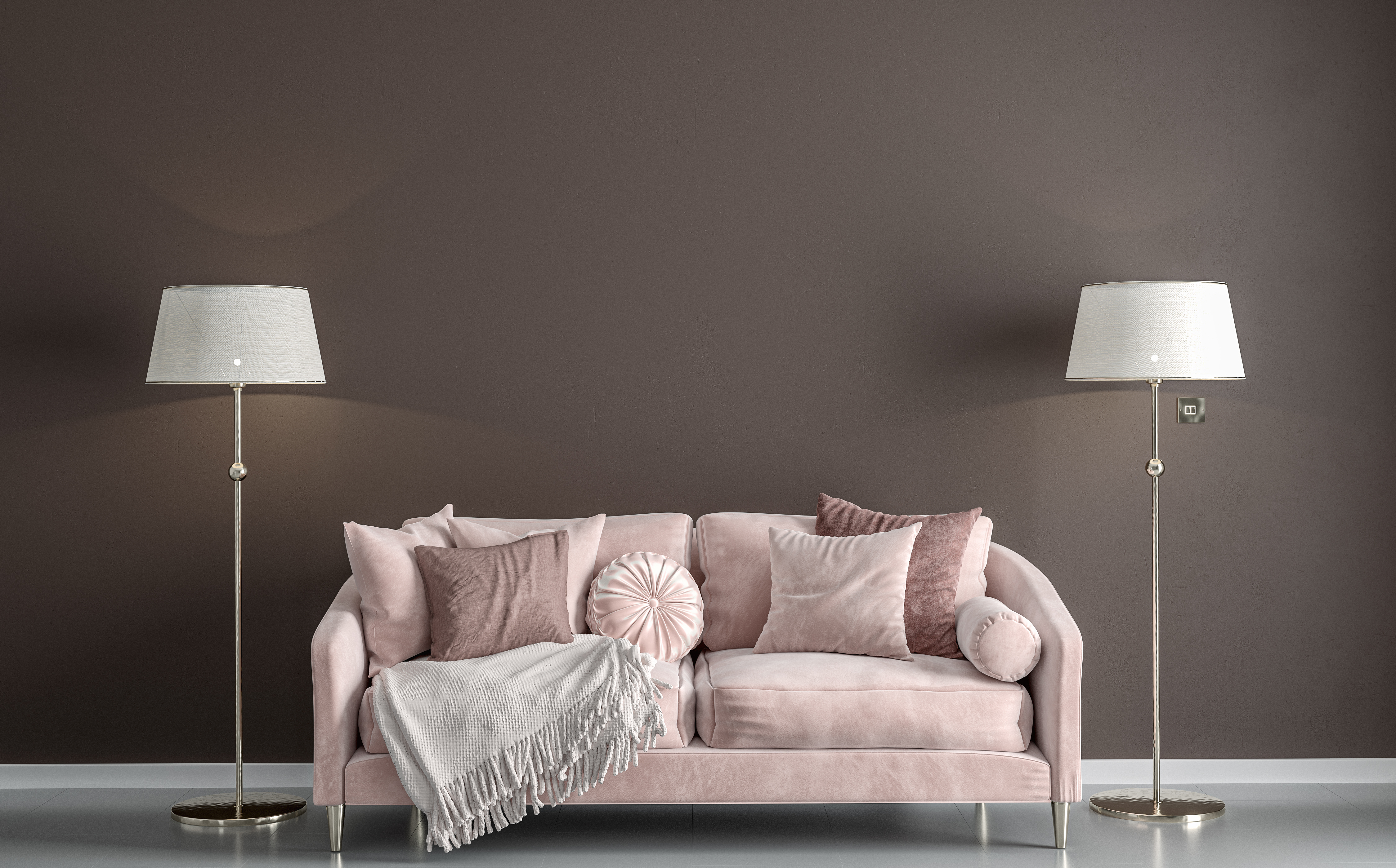 A pink sofa with matching décor 