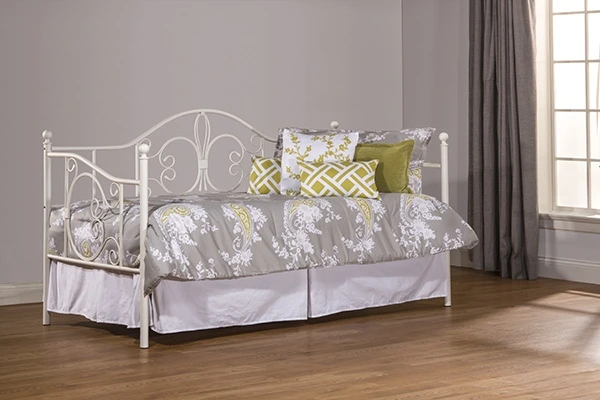 The Hillsdale Furniture Ruby collection white day bed with grey, chartreuse, and white bedding 