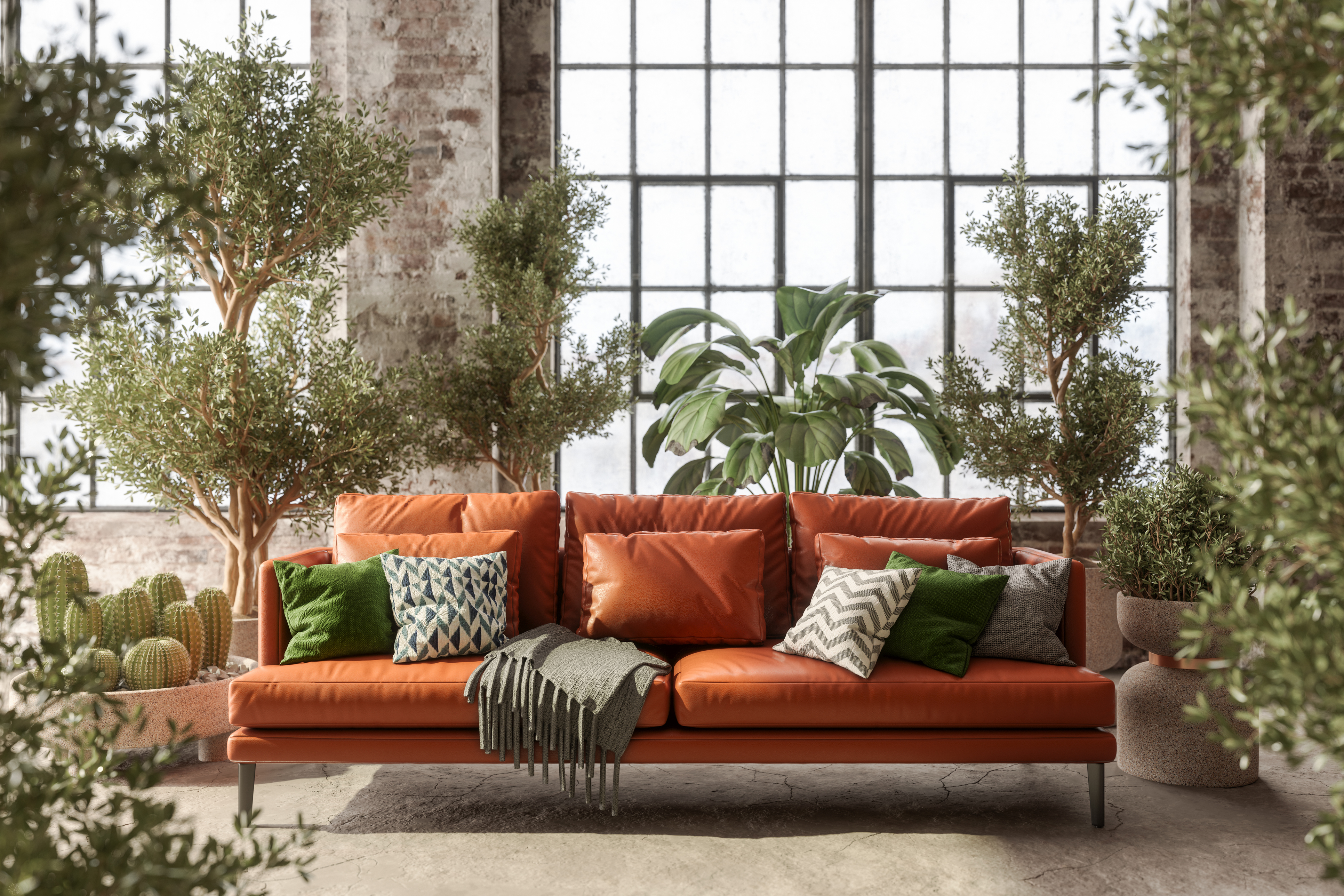 A boho-inspired den with multi-color and pattern décor and plants 