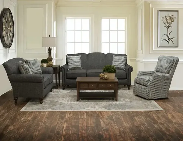 The England Furniture Eliza collection sofa and loveseat with a matching recliner in a living room 