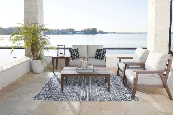 The Signature Design by Ashley Emmeline collection 4-piece outdoor seating set with décor 