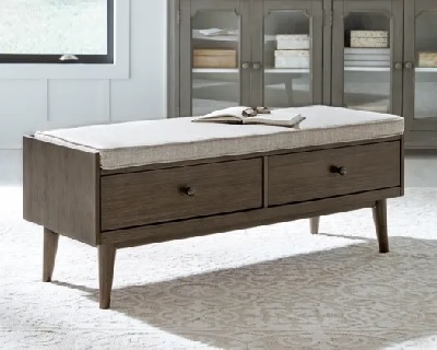 The Signature Design by Ashley Chetfield collection storage bench with décor 