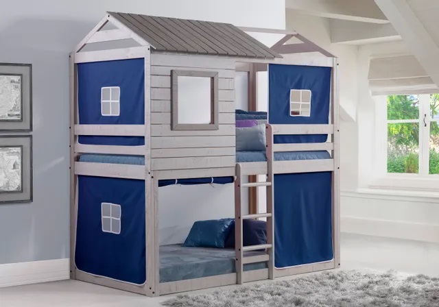 Modern children’s bedroom with a deer blind style bunk bed with blue tents on each side. 