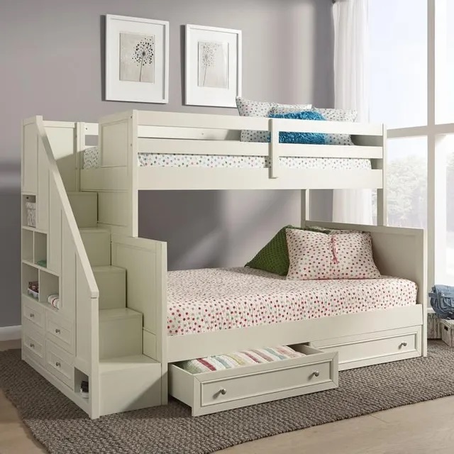 Modern children’s bedroom with a white bunk bed with storage and built in stairs. 