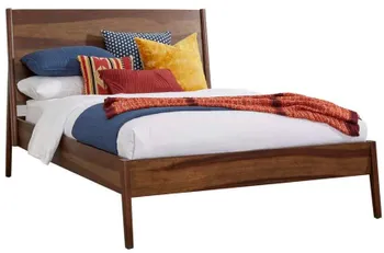 Front view of the Progressive Furniture Bungalow collection bed frame with bedding
